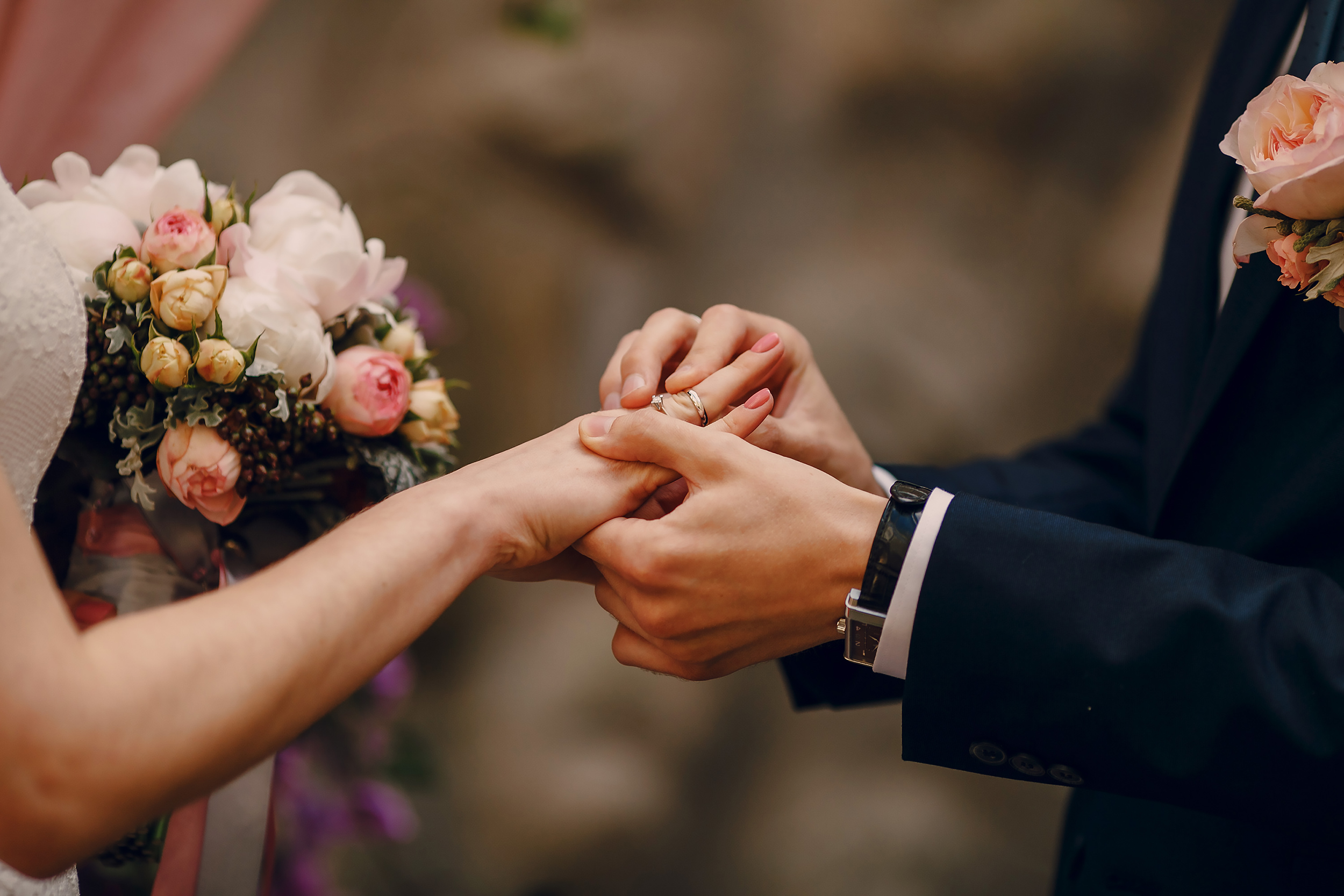 groom-putting-ring-bride-s-finger